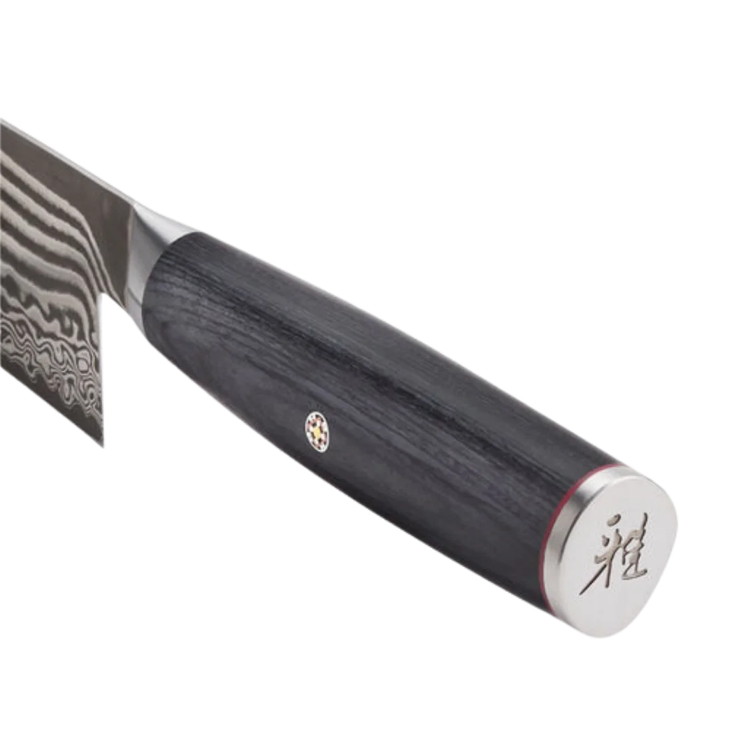 Miyabi Kaizen II 5000FCD 7-inch Bunka knife showcasing its Damascus steel blade and ergonomic handle.