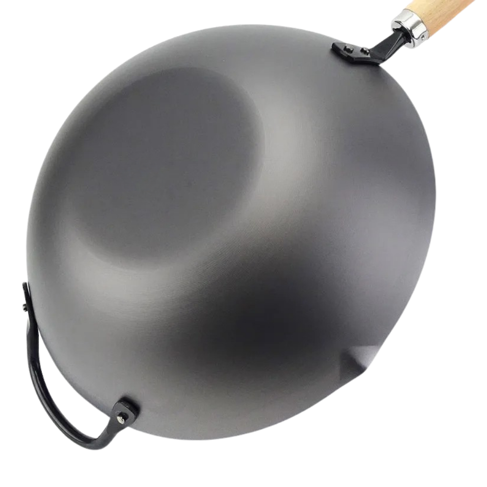 Black Yoshikawa Cook-Pal Ren Nitrided Carbon Steel Wok with a wooden handle on a white background