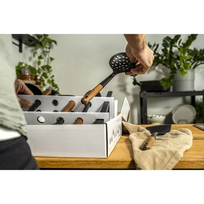 Staub Silicone Kitchen Utensil Set, man pulling out one utencil