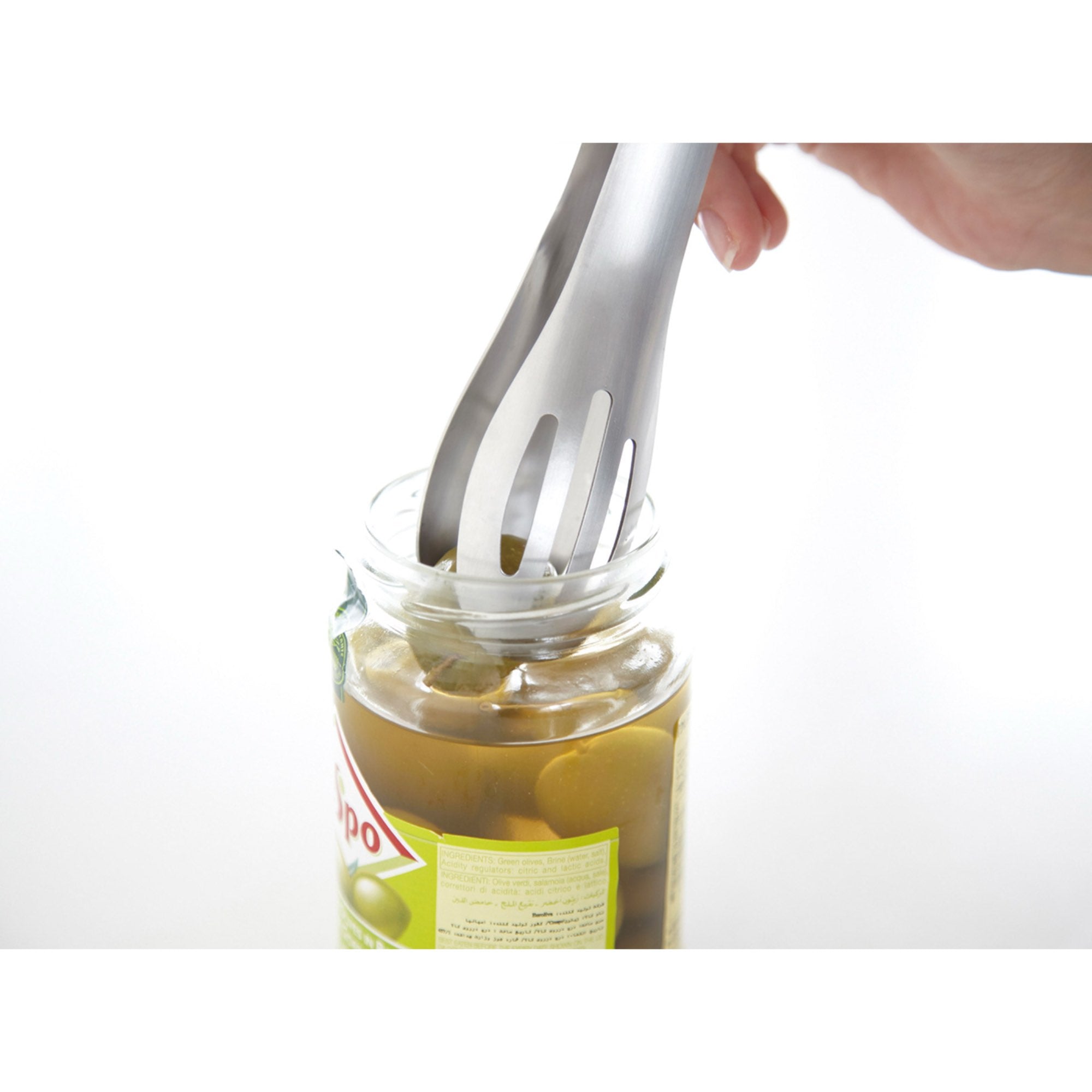 Stainless steel serving tongs lifting olives from a jar, showcasing multi-function kitchen utensil.