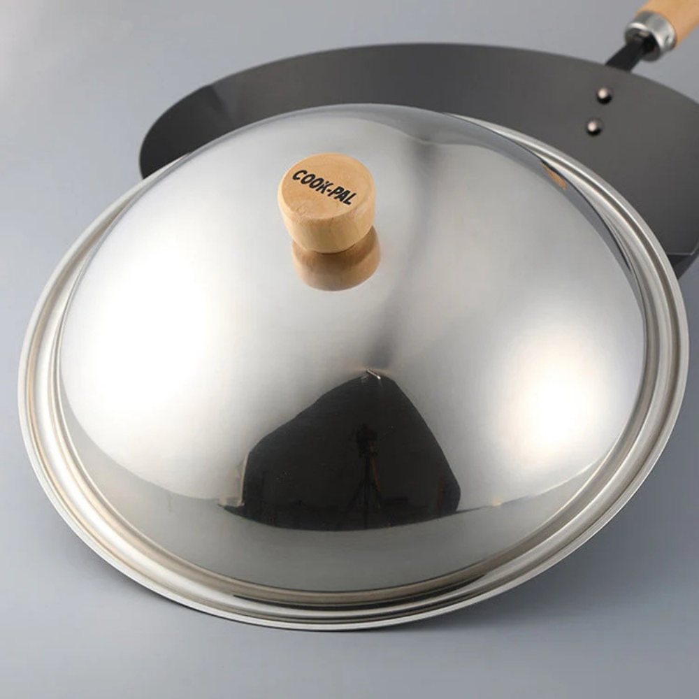 YOSHIKAWA COOK-PAL REN 30CM STAINLESS STEEL LID with wooden knob on a wok background.