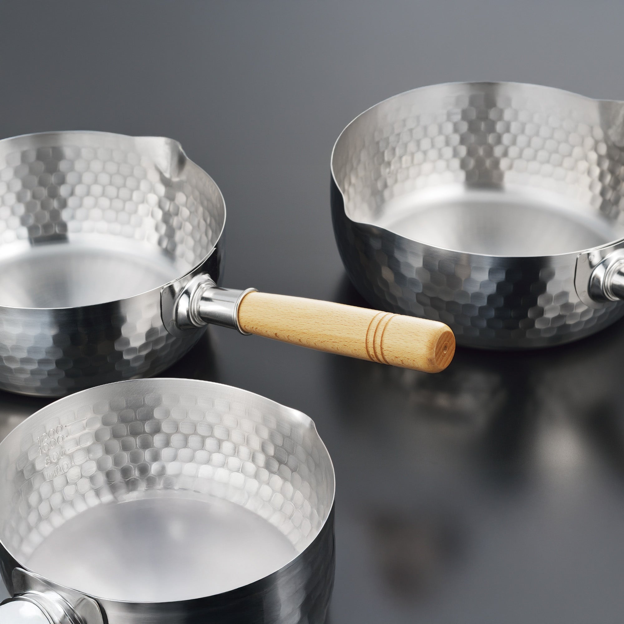 Yoshikawa Yukihira Saucepan 20cm with Lid, stainless steel pots with hammered design and wooden handles.