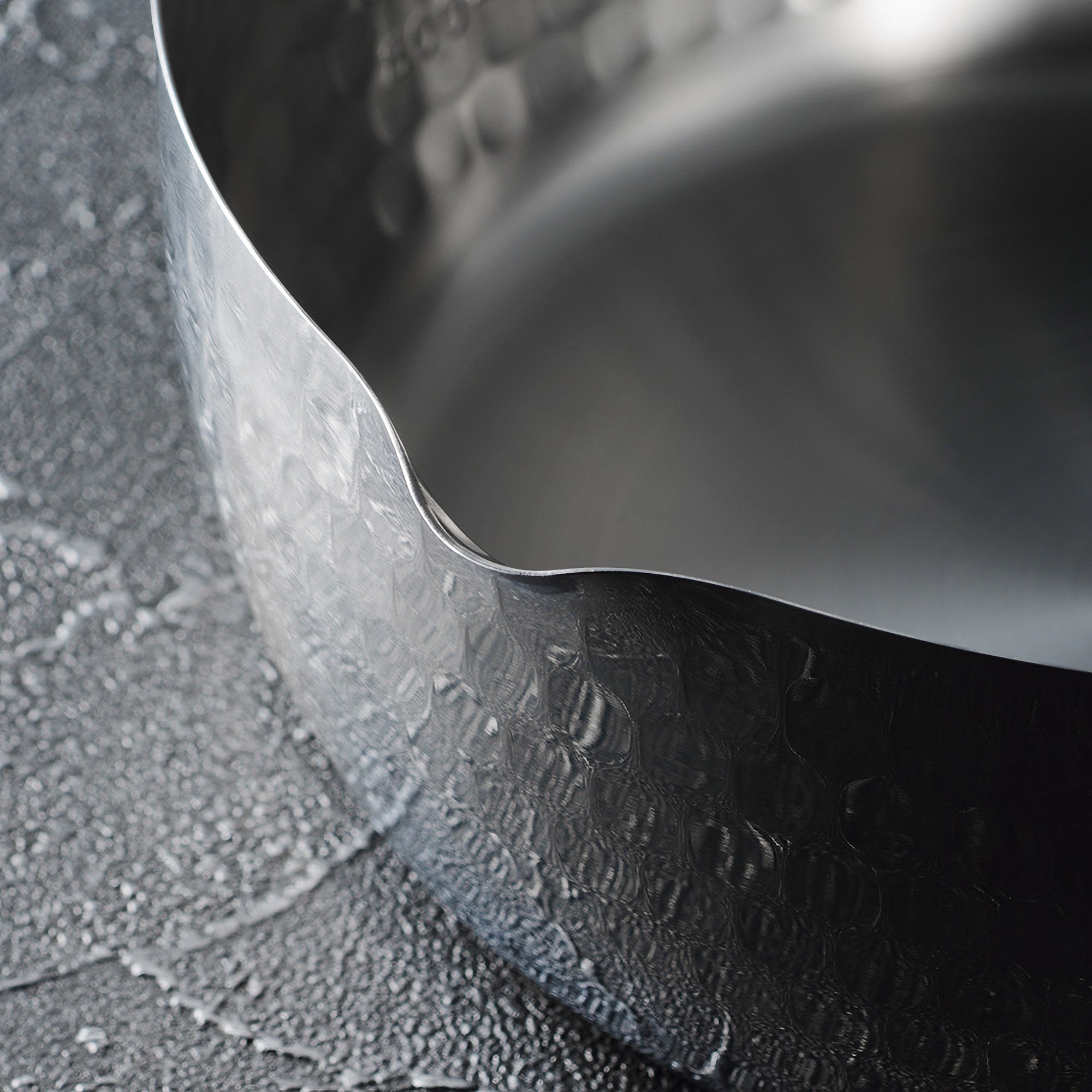 Yoshikawa Yukihira Saucepan 20cm with lid, stainless steel pot boasting a lightweight, hammered design.